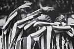 <span class="style1">Dave Watson is buried under his ecstatic team mates after opening the scoring</span>